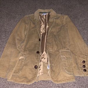 A clean nice tan sweater